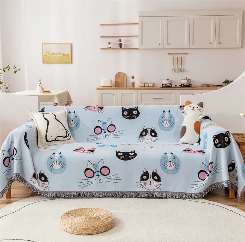 Dekorativer Sofaüberwurf mit Cartoon-Katze