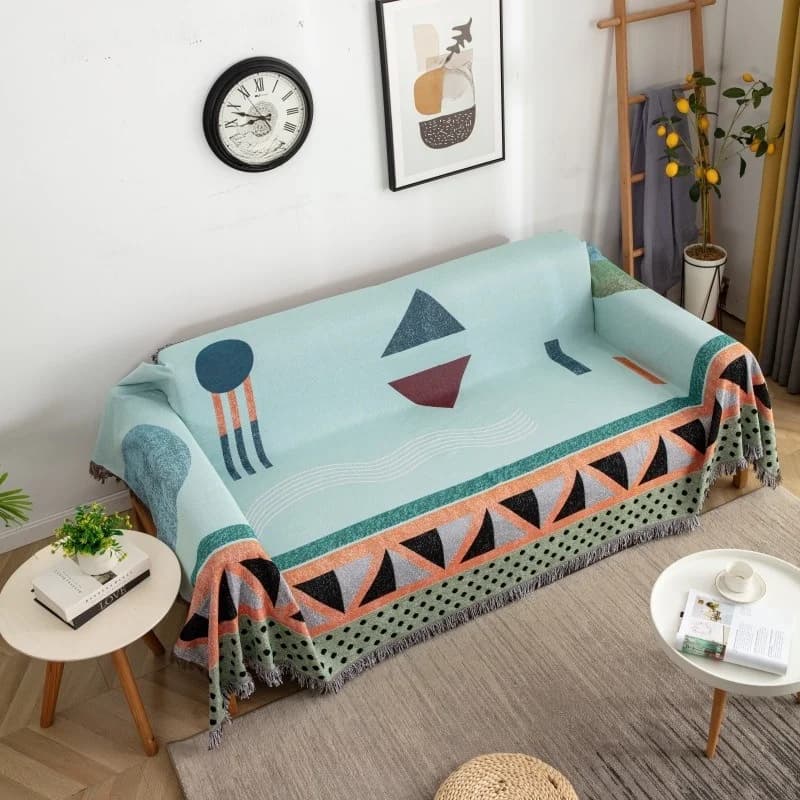Sofaüberwurf mit geometrischem Muster